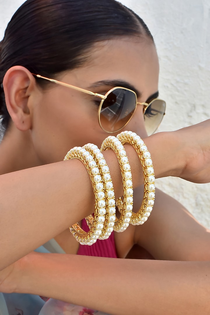 Gold Finish Kundan Polki Bangles (Set of 4) by Swabhimann Jewellery at Pernia's Pop Up Shop