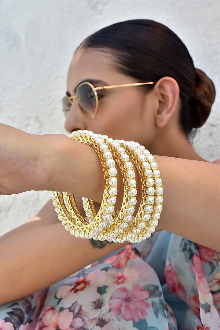 Gold Finish Kundan Polki Bangles (Set of 4) by Swabhimann Jewellery at Pernia's Pop Up Shop