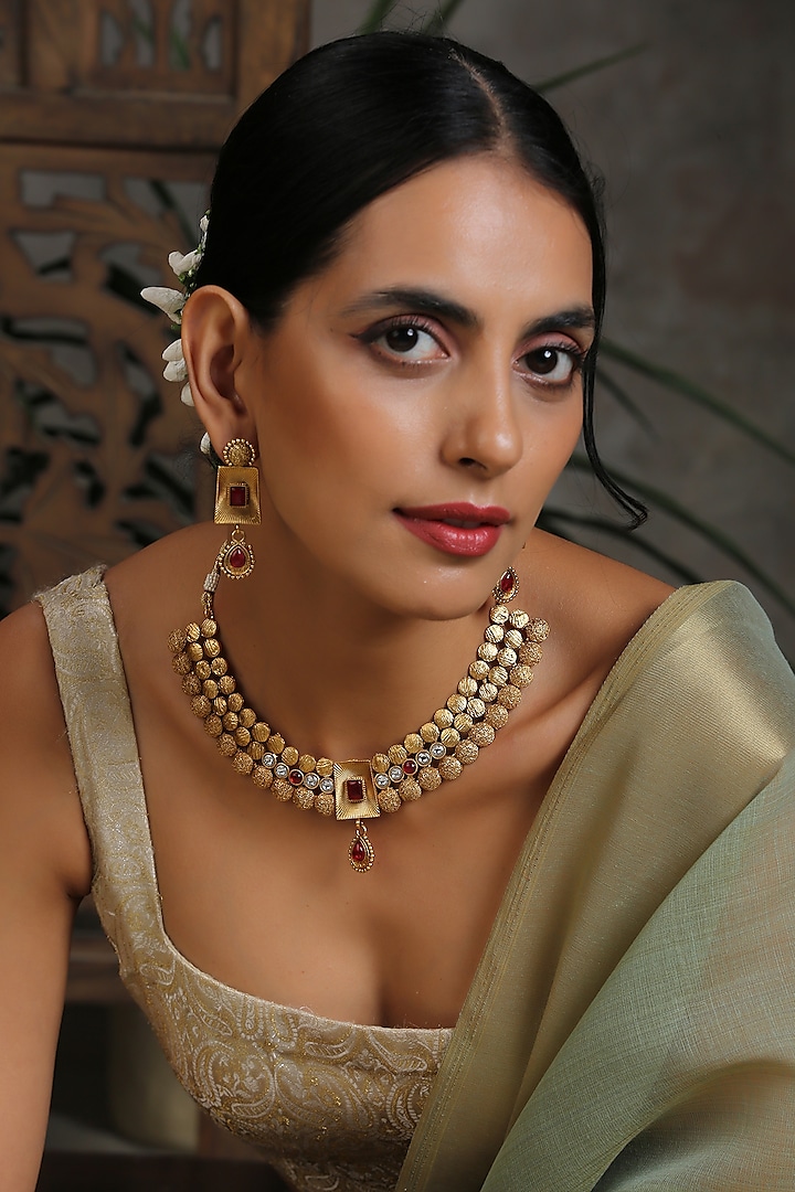 Gold Finish Synthetic Stones Necklace Set by Swabhimann Jewellery