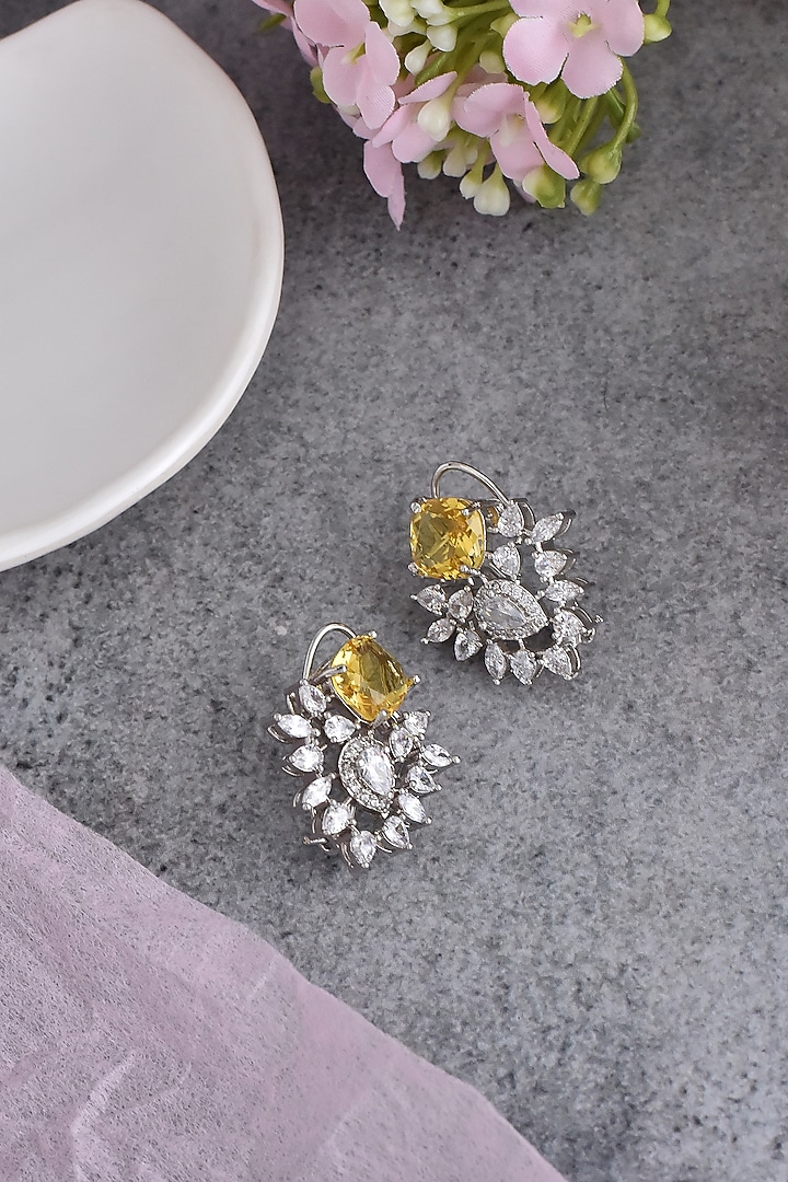 White Finish Yellow Synthetic Stone & Zirconia Stud Earrings by Swabhimann Jewellery at Pernia's Pop Up Shop