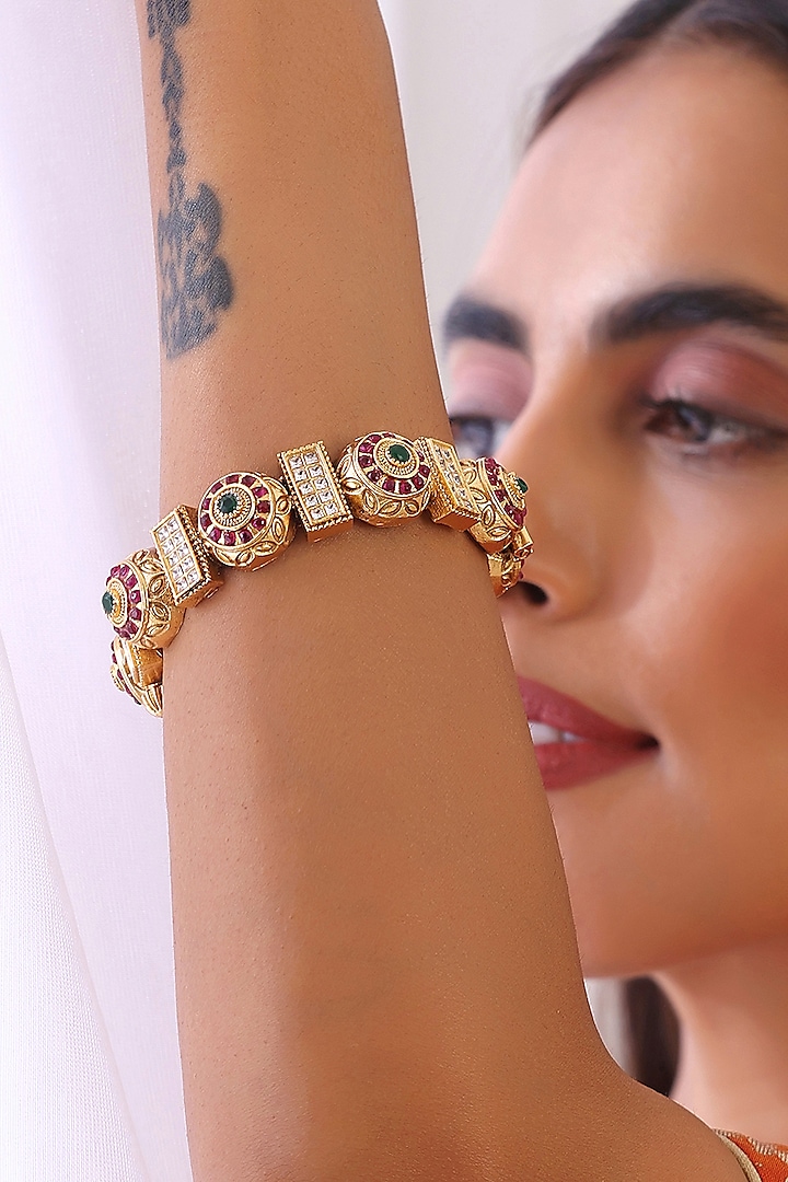 Gold Finish Red & Green Stone Kada by Swabhimann Jewellery at Pernia's Pop Up Shop