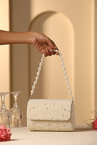 Beige Velvet Crystal & Pearl Embellished Hand Bag by SWABHIMANN ACCESSORIES