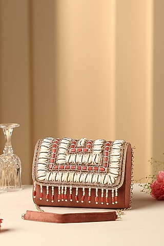 Mauve Velvet Sea Shell & Pearl Embellished Hand Bag by SWABHIMANN ACCESSORIES