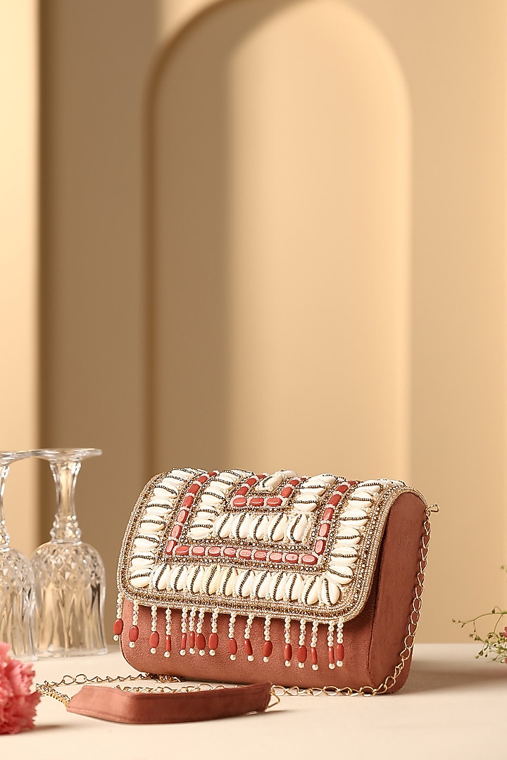Mauve Velvet Sea Shell & Pearl Embellished Hand Bag by SWABHIMANN ACCESSORIES at Pernia's Pop Up Shop