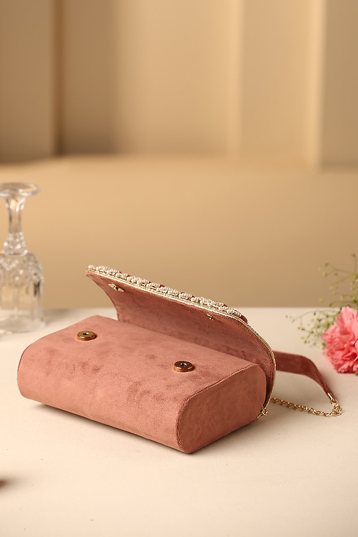 Mauve Velvet Sea Shell & Pearl Embellished Hand Bag by SWABHIMANN ACCESSORIES at Pernia's Pop Up Shop