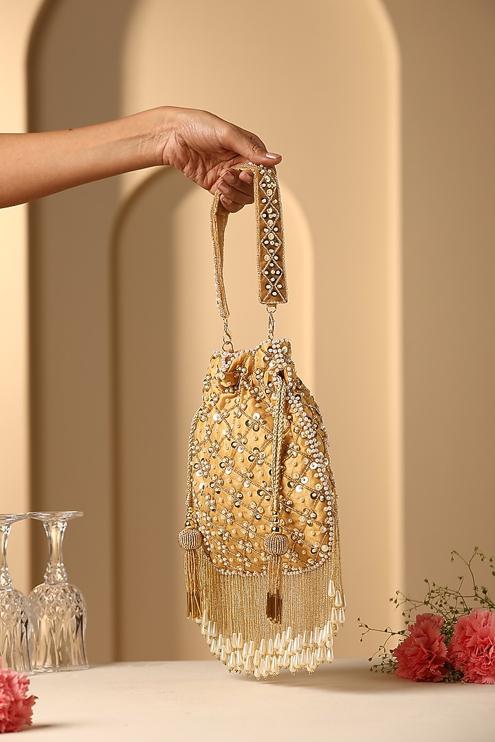Yellow Silk Sequins & Pearl Embellished Potli by SWABHIMANN ACCESSORIES at Pernia's Pop Up Shop