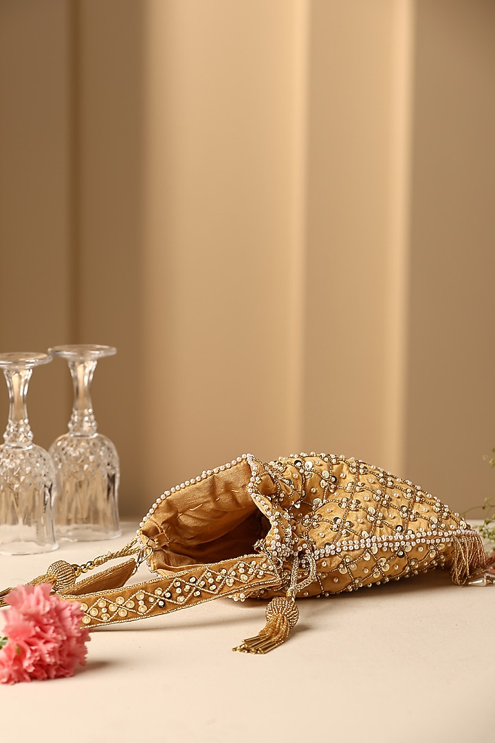 Yellow Silk Sequins & Pearl Embellished Potli by SWABHIMANN ACCESSORIES at Pernia's Pop Up Shop