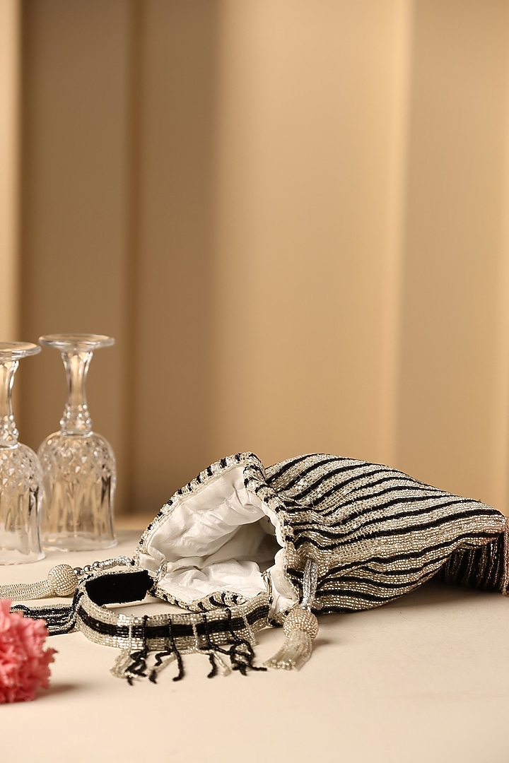 Black Silk Nalki Bead Work Potli by SWABHIMANN ACCESSORIES at Pernia's Pop Up Shop