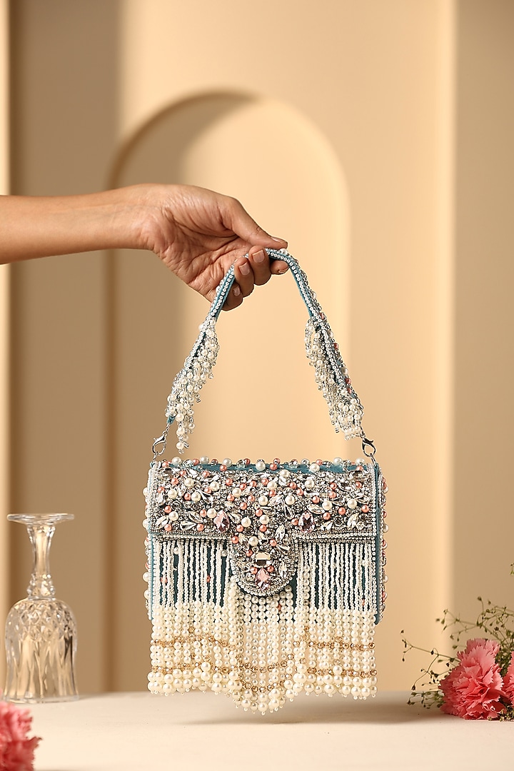 Teal Velvet Crystal & Pearl Embellished Hand Bag by SWABHIMANN ACCESSORIES at Pernia's Pop Up Shop