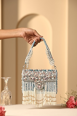 Teal Velvet Crystal & Pearl Embellished Hand Bag by SWABHIMANN ACCESSORIES