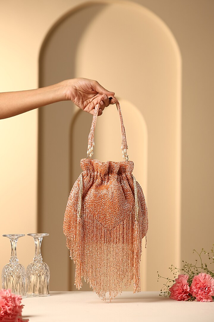 Orange Silk Nalki Bead Work Potli by SWABHIMANN ACCESSORIES at Pernia's Pop Up Shop