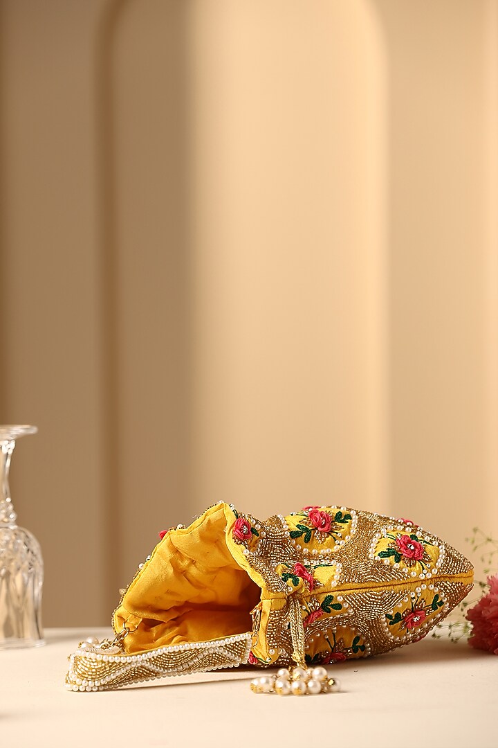 Yellow Silk Embroidered Potli by SWABHIMANN ACCESSORIES at Pernia's Pop Up Shop