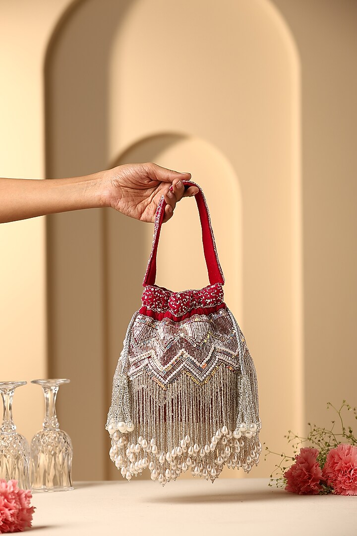 Red Velvet Pearl & Nalki Bead Work Potli by SWABHIMANN ACCESSORIES at Pernia's Pop Up Shop