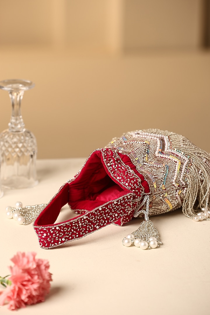 Red Velvet Pearl & Nalki Bead Work Potli by SWABHIMANN ACCESSORIES at Pernia's Pop Up Shop