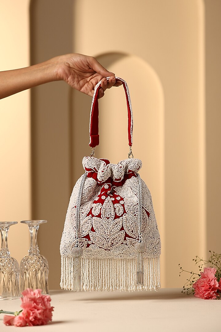 Red Velvet Pearl Embroidered Potli by SWABHIMANN ACCESSORIES at Pernia's Pop Up Shop
