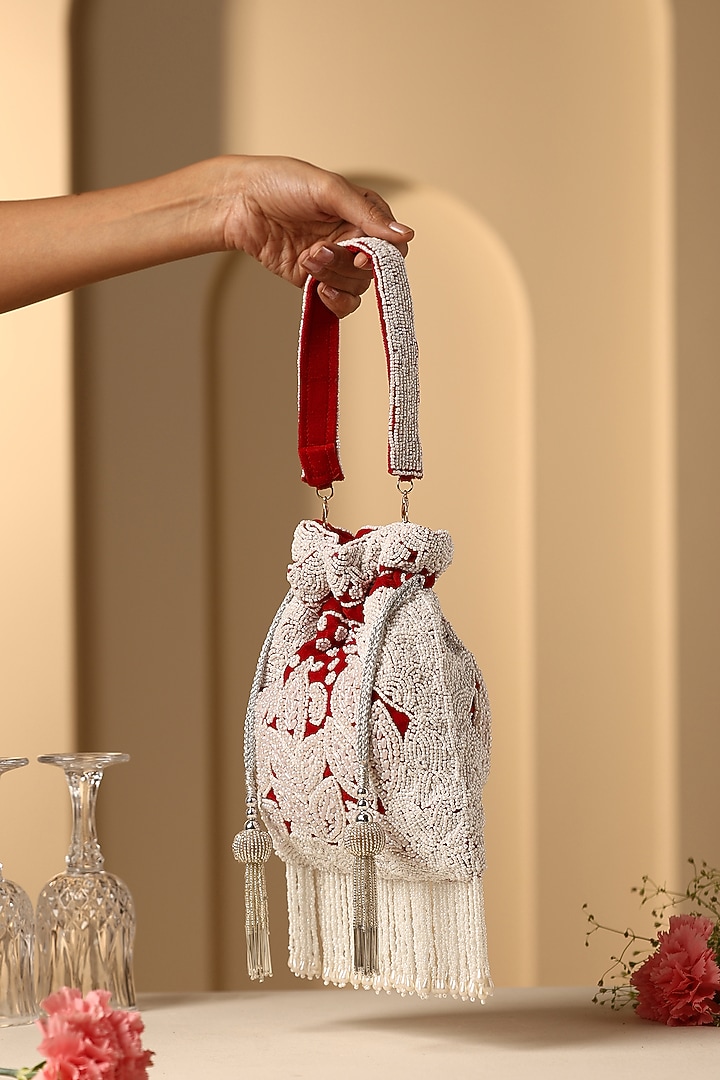 Red Velvet Pearl Embroidered Potli by SWABHIMANN ACCESSORIES at Pernia's Pop Up Shop