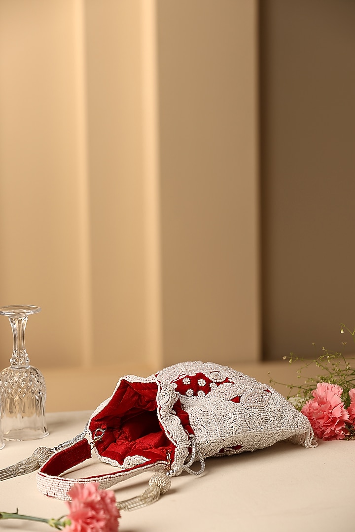 Red Velvet Pearl Embroidered Potli by SWABHIMANN ACCESSORIES at Pernia's Pop Up Shop