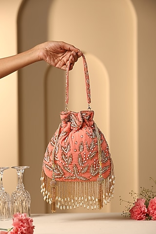 Peach Velvet Sequins & Pearl Embroidered Potli by SWABHIMANN ACCESSORIES