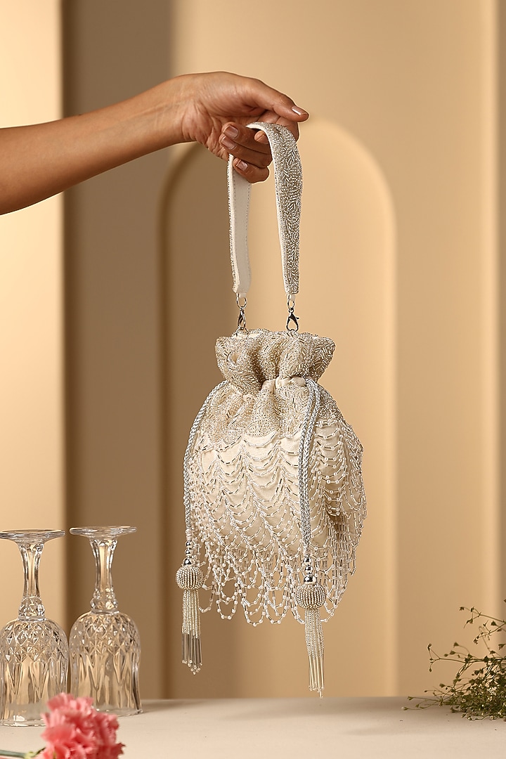 White Silk Nalki Bead Work Potli by SWABHIMANN ACCESSORIES at Pernia's Pop Up Shop