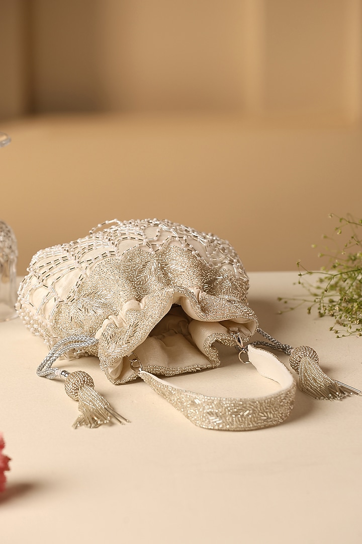White Silk Nalki Bead Work Potli by SWABHIMANN ACCESSORIES at Pernia's Pop Up Shop