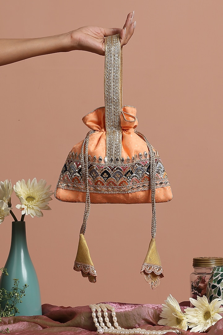 Peach Brocade Potli Bag by SWABHIMANN ACCESSORIES at Pernia's Pop Up Shop