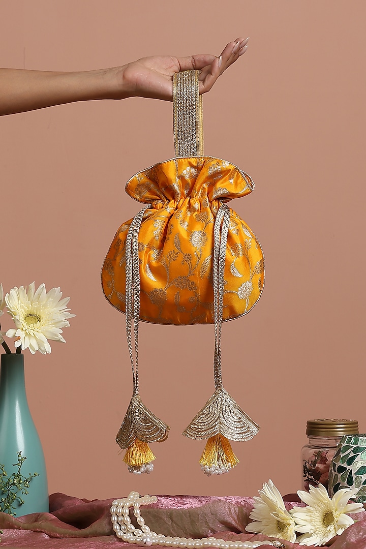 Yellow Pure Silk Potli Bag by SWABHIMANN ACCESSORIES at Pernia's Pop Up Shop