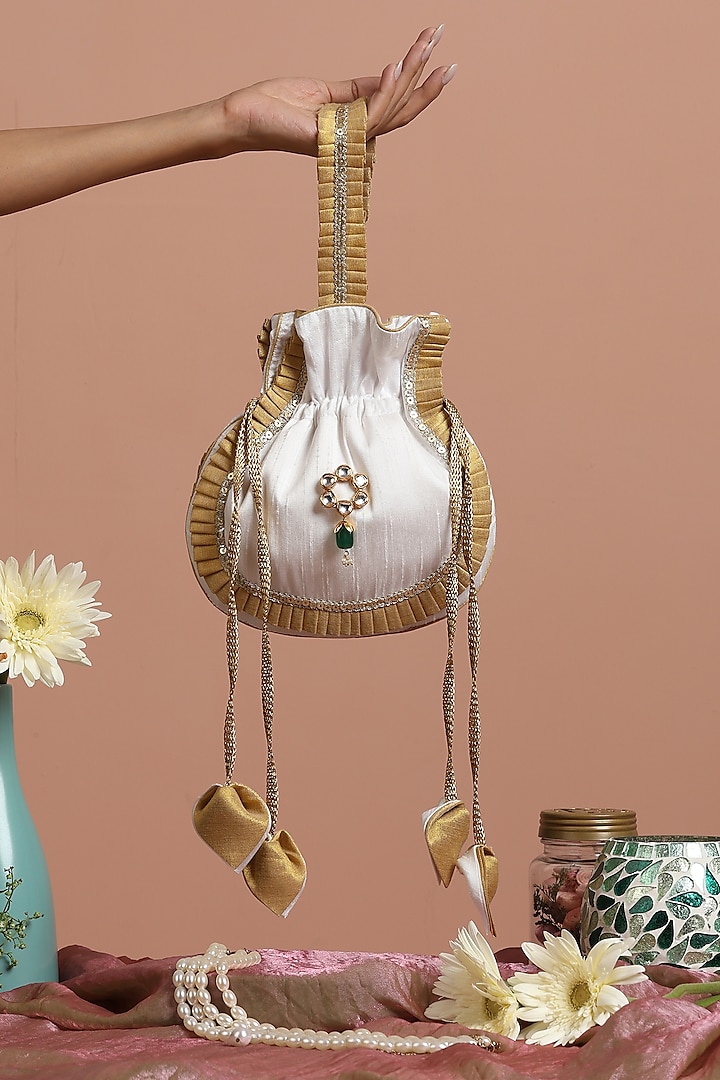 White & Gold Silk Potli Bag by SWABHIMANN ACCESSORIES at Pernia's Pop Up Shop