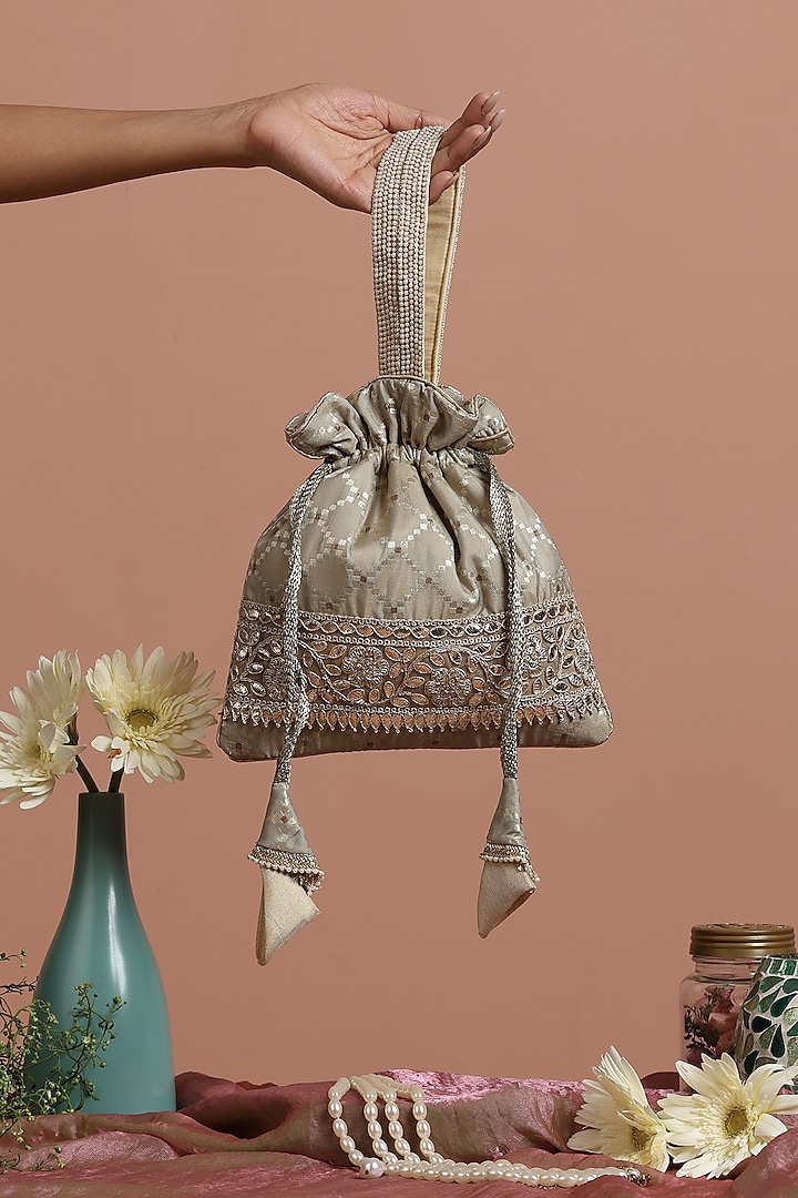 Grey Brocade Potli Bag by SWABHIMANN ACCESSORIES at Pernia's Pop Up Shop