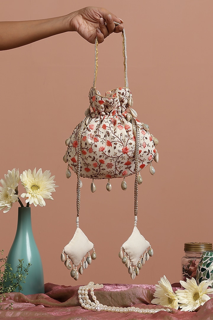 Cream & Peach Pure Cotton Floral Potli Bag by SWABHIMANN ACCESSORIES at Pernia's Pop Up Shop