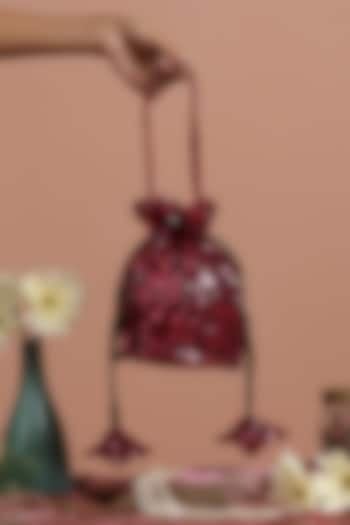 Maroon Sequins Net Potli Bag by SWABHIMANN ACCESSORIES at Pernia's Pop Up Shop