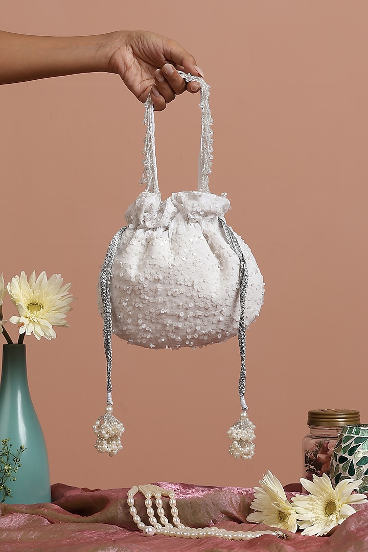 White Georgette Sequins Potli Bag by SWABHIMANN ACCESSORIES at Pernia's Pop Up Shop