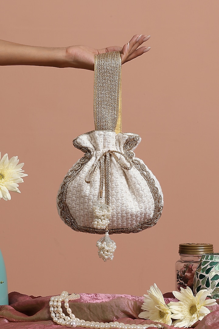 White Silk Sequins Potli Bag by SWABHIMANN ACCESSORIES at Pernia's Pop Up Shop