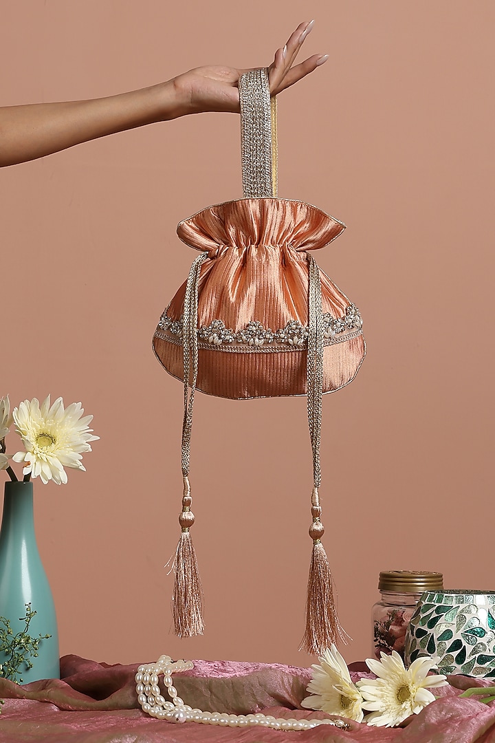 Peach Pure Silk Potli Bag by SWABHIMANN ACCESSORIES at Pernia's Pop Up Shop