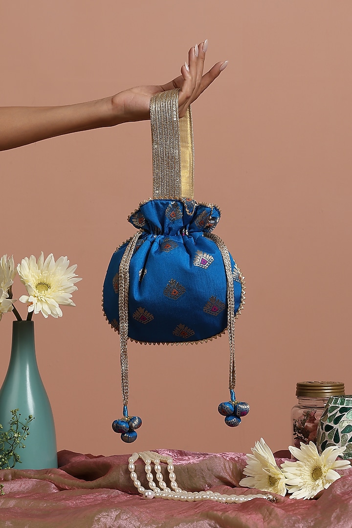 Blue & Gold Brocade Potli Bag by SWABHIMANN ACCESSORIES at Pernia's Pop Up Shop