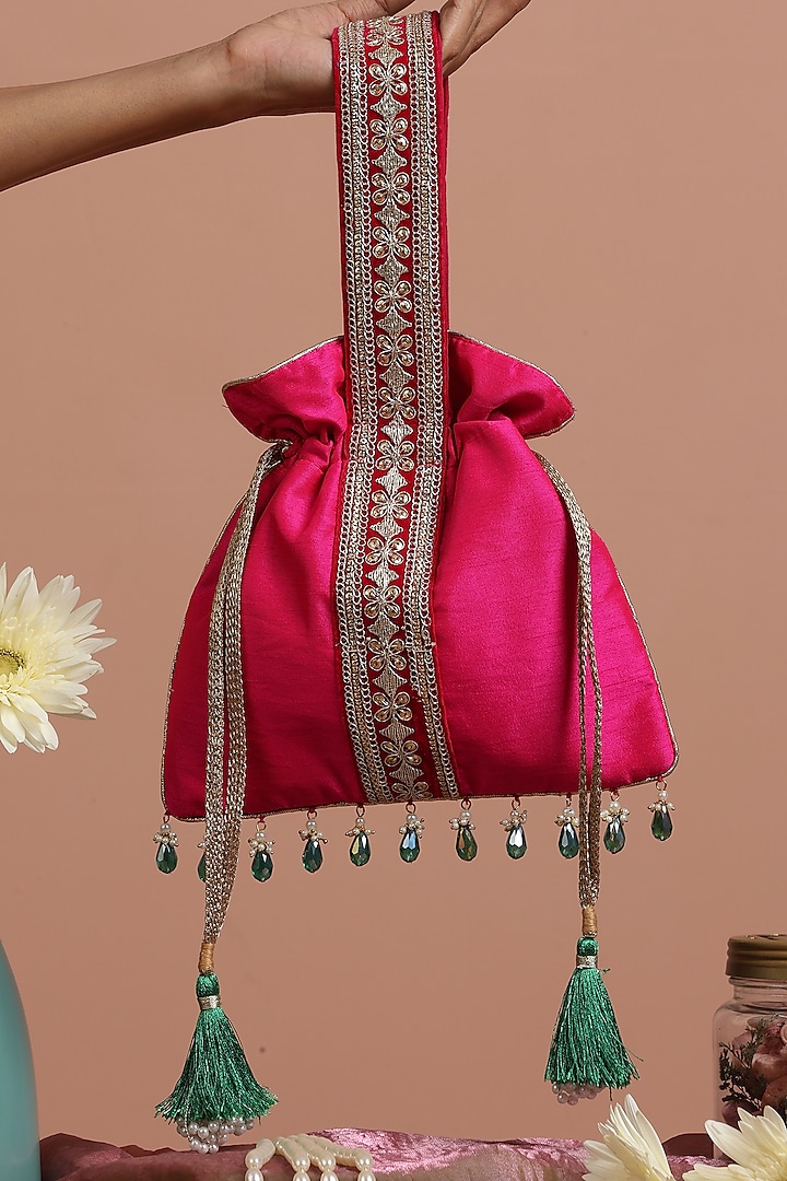 Magenta Pink & Green Silk Potli Bag by SWABHIMANN ACCESSORIES at Pernia's Pop Up Shop