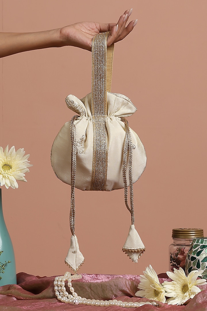 Cream & Gold Silk Potli Bag by SWABHIMANN ACCESSORIES at Pernia's Pop Up Shop