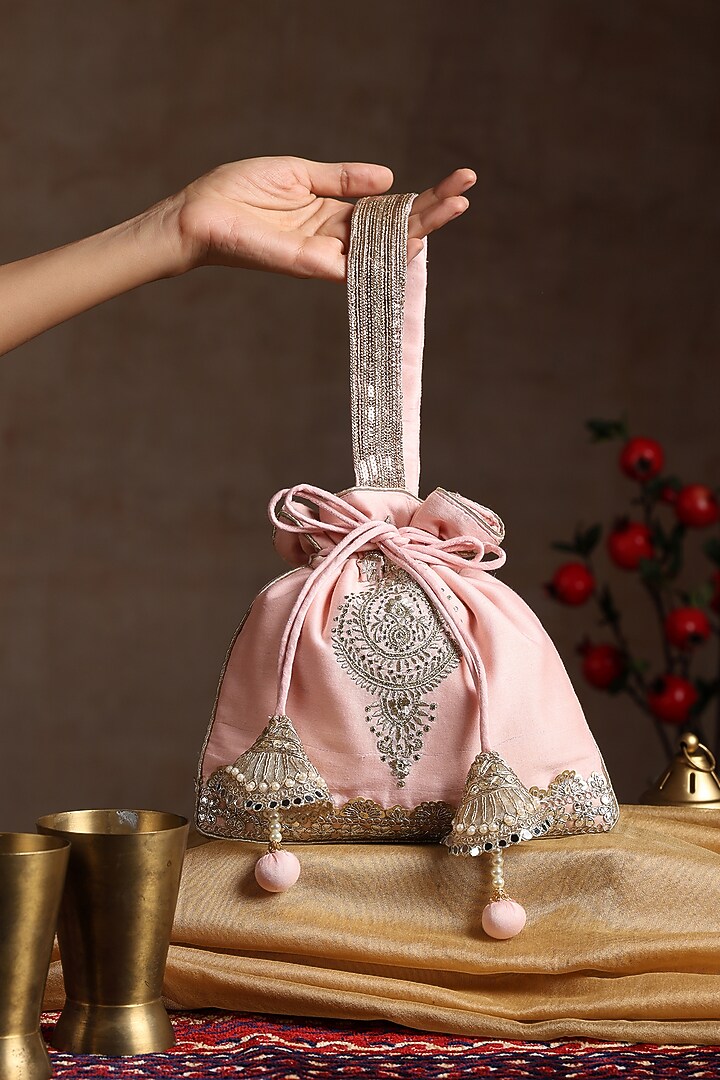 Peach Chanderi Embroidered Potli Bag by SWABHIMANN ACCESSORIES at Pernia's Pop Up Shop