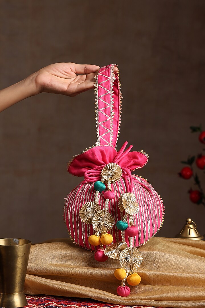 Pink Chanderi Embroidered Potli Bag by SWABHIMANN ACCESSORIES at Pernia's Pop Up Shop