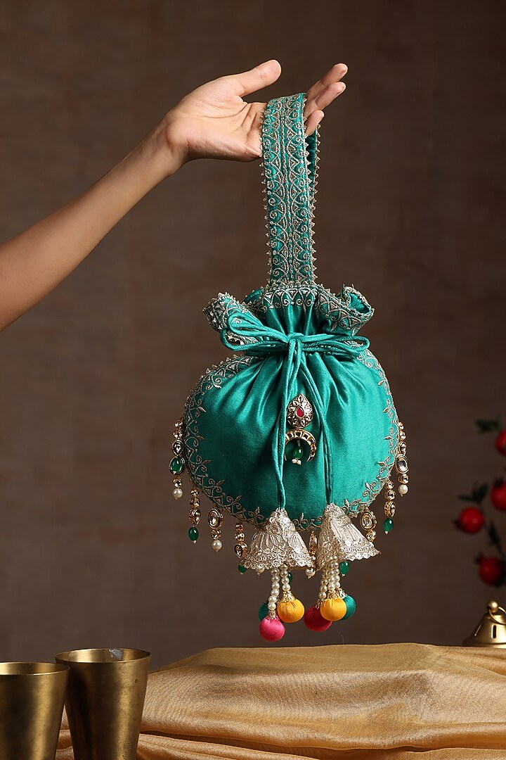 Green Chanderi Embroidered Potli Bag by SWABHIMANN ACCESSORIES at Pernia's Pop Up Shop