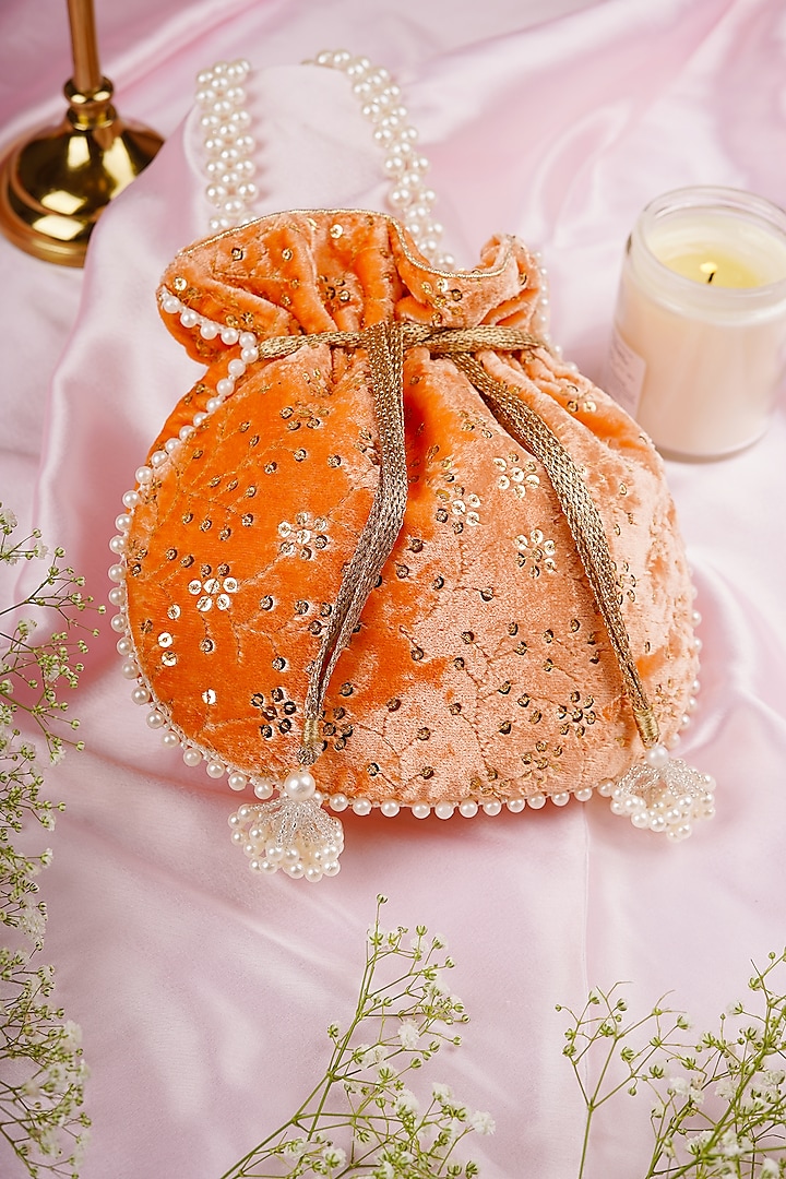 Peach Velvet Embroidered Potli by SWABHIMANN ACCESSORIES at Pernia's Pop Up Shop