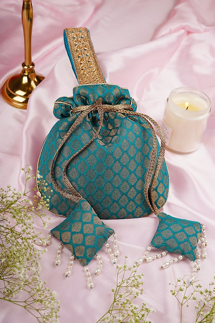 Teal Chanderi Pearl Embroidered Potli by SWABHIMANN ACCESSORIES at Pernia's Pop Up Shop