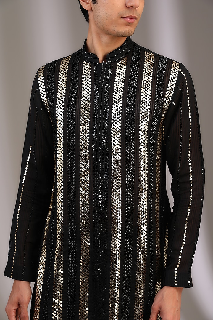 Black Ghicha Embellished Kurta Set
by Sawan Gandhi Men at Pernia's Pop Up Shop