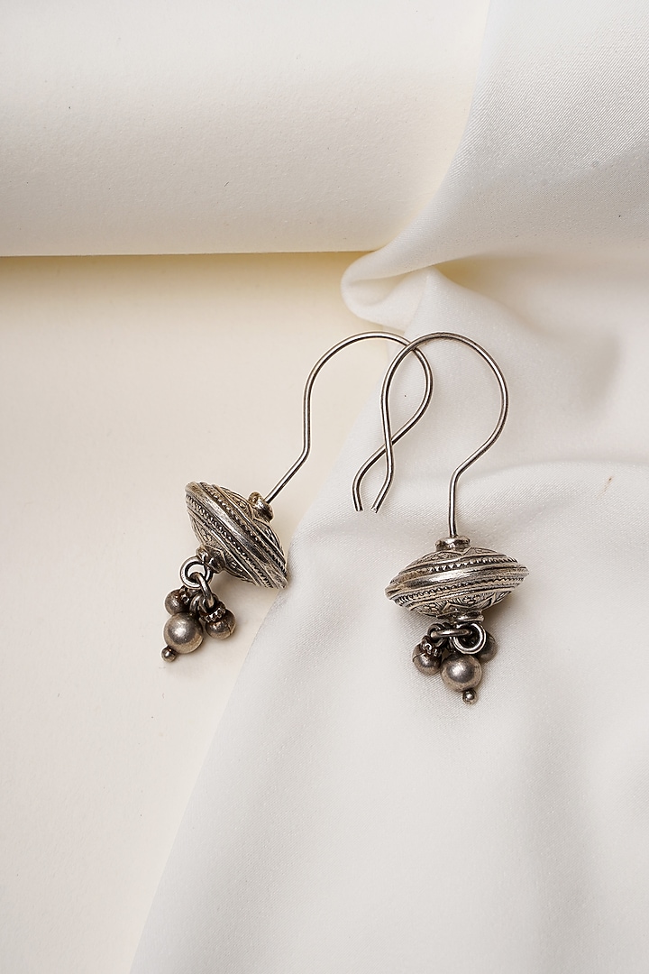 Oxidised Silver Finish Curved Hook Ball Dangler Earrings In Sterling Silver by Swadeshi Pitara at Pernia's Pop Up Shop
