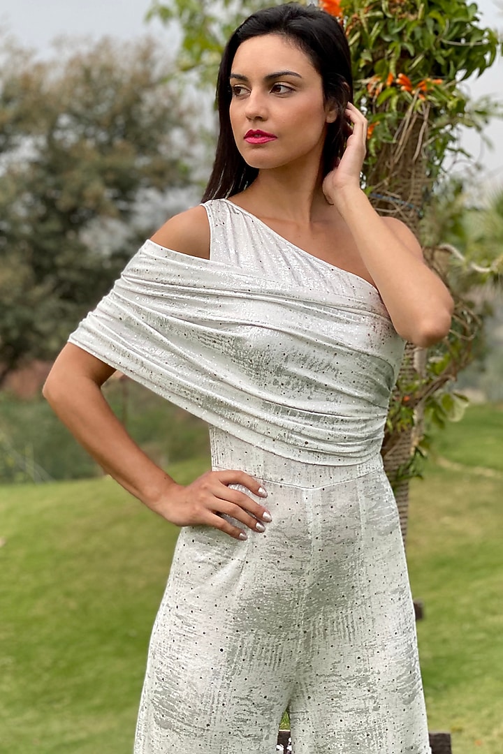Ivory & Silver One Shoulder Embellished Jumpsuit by Swatee Singh at Pernia's Pop Up Shop
