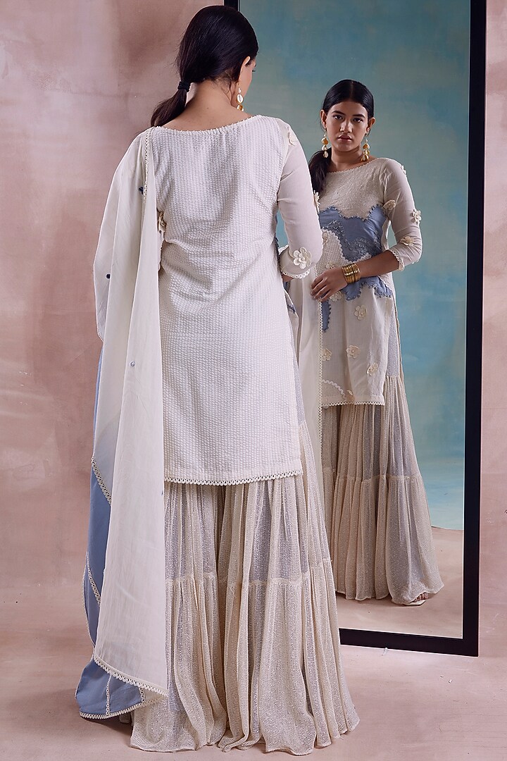 Ivory Mesh Tiered Party Wear Sharara Set by Shwetanga at Pernia's Pop Up Shop