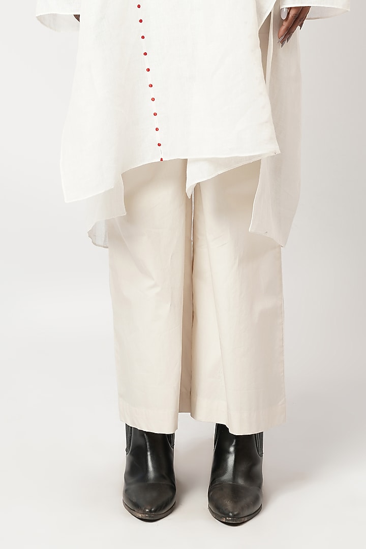 Ivory Linen Thread Embroidered Panelled Kurta Set by Shwetanga at Pernia's Pop Up Shop