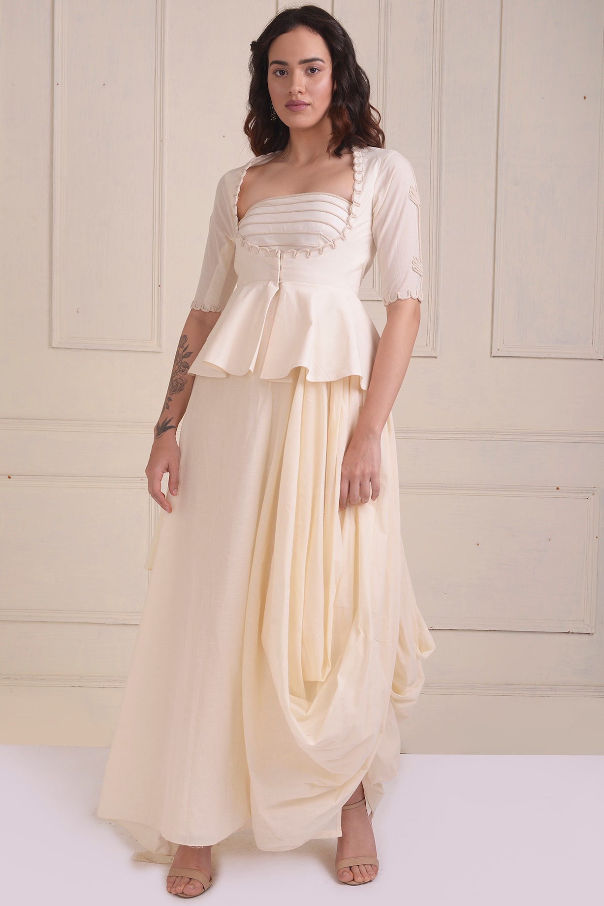 Ivory Organic Cotton Draped Gown With Peplum Jacket by Shwetanga at Pernia s Pop Up Shop 2024