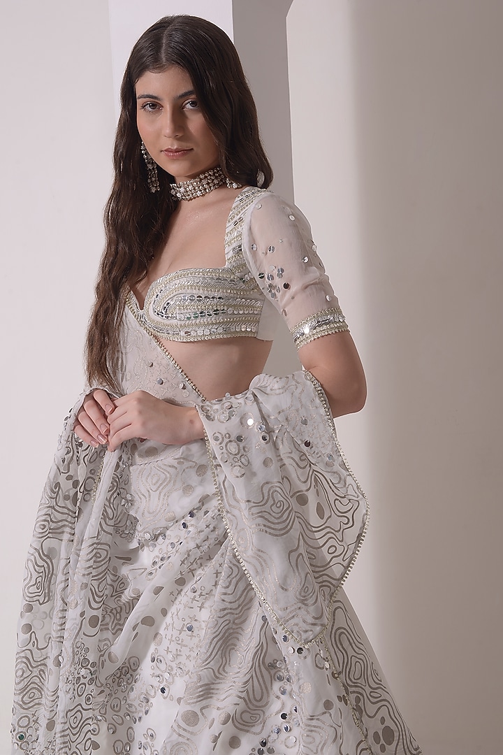 Ecru Crepe & Organza Foil Printed Tiered Wedding Lehenga Set by Shwetanga at Pernia's Pop Up Shop
