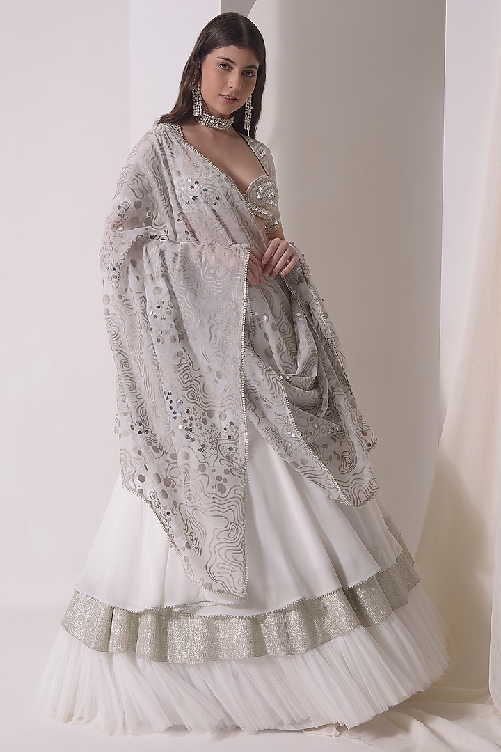 Ecru Crepe & Organza Foil Printed Tiered Wedding Lehenga Set by Shwetanga at Pernia's Pop Up Shop