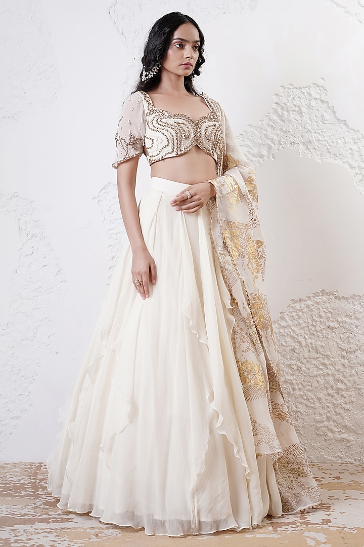 Ivory Organza Ruffled Lehenga Set by Shwetanga